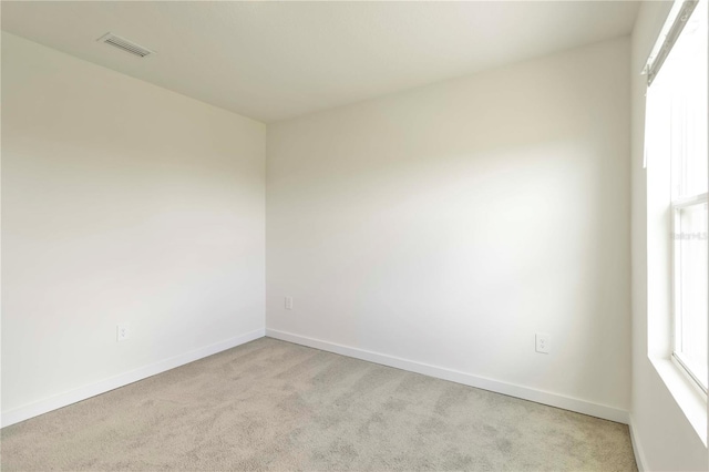 17209 Barnwood Pl, Bradenton, FL 34211 - unfurnished room featuring light colored carpet and baseboards