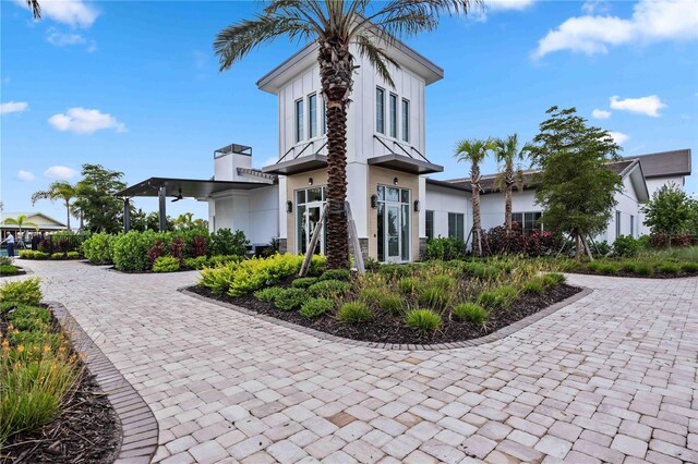 17209 Barnwood Pl, Bradenton, FL 34211 - view of front facade featuring a chimney