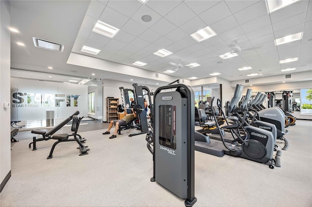 17209 Barnwood Pl, Bradenton, FL 34211 - gym featuring healthy amount of natural light and a drop ceiling