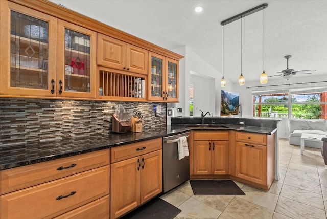 6805 225th St E, Bradenton, FL 34211 - kitchen with dishwasher, a peninsula, tasteful backsplash, open floor plan, and dark stone counters