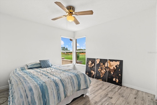 6805 225th St E, Bradenton, FL 34211 - bedroom with wood finished floors and ceiling fan