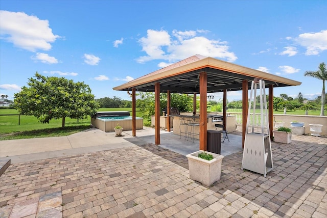 6805 225th St E, Bradenton, FL 34211 - view of patio / terrace featuring a hot tub and a gazebo