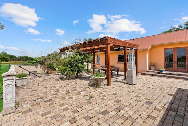 6805 225th St E, Bradenton, FL 34211 - view of patio with french doors, a pergola, and outdoor dining area