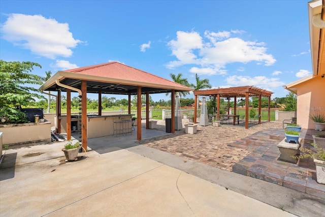 6805 225th St E, Bradenton, FL 34211 - view of patio / terrace with a gazebo and a pergola