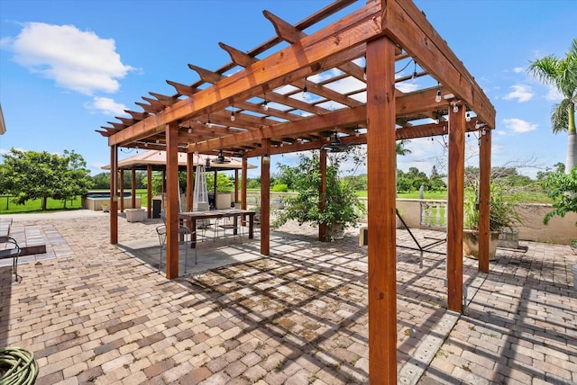 6805 225th St E, Bradenton, FL 34211 - view of patio with a hot tub and a pergola