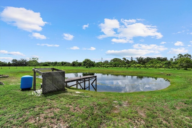 6805 225th St E, Bradenton, FL 34211 - dock area with a water view and a lawn