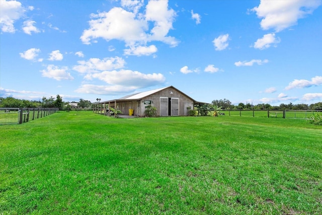 6805 225th St E, Bradenton, FL 34211 - view of yard with an outdoor structure, a view of rural / pastoral area, and an outbuilding