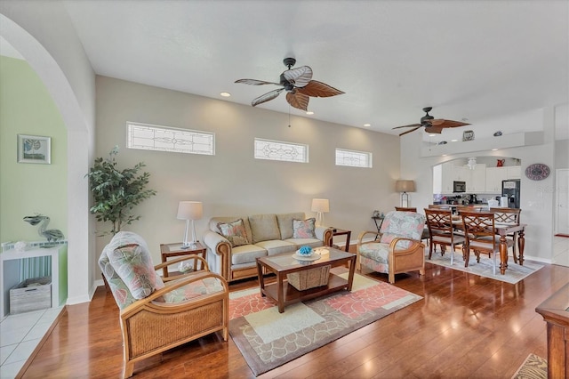 2025 Lynx Run, North Port, FL 34288 - living area with arched walkways, a ceiling fan, hardwood / wood-style flooring, and recessed lighting
