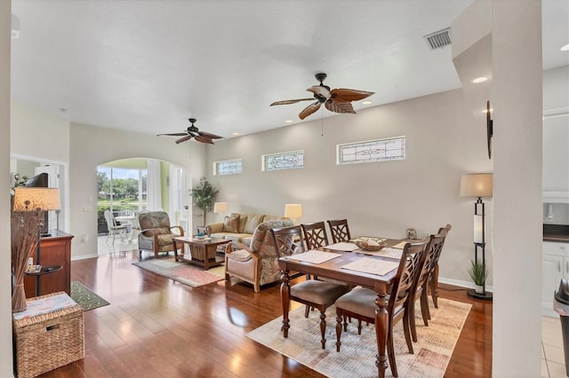 2025 Lynx Run, North Port, FL 34288 - dining space featuring arched walkways, ceiling fan, hardwood / wood-style flooring, and recessed lighting