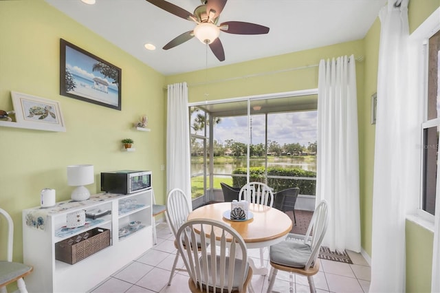 2025 Lynx Run, North Port, FL 34288 - dining area featuring light tile patterned floors, a water view, ceiling fan, and recessed lighting
