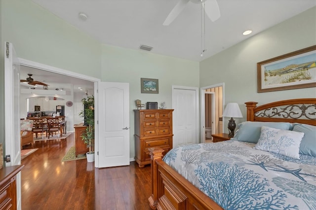 2025 Lynx Run, North Port, FL 34288 - bedroom featuring dark wood-style flooring, a high ceiling, a closet, and ceiling fan