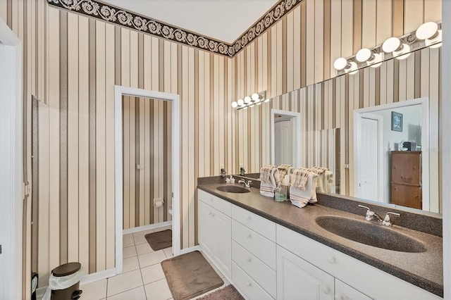 2025 Lynx Run, North Port, FL 34288 - full bathroom with tile patterned flooring, double vanity, and wallpapered walls