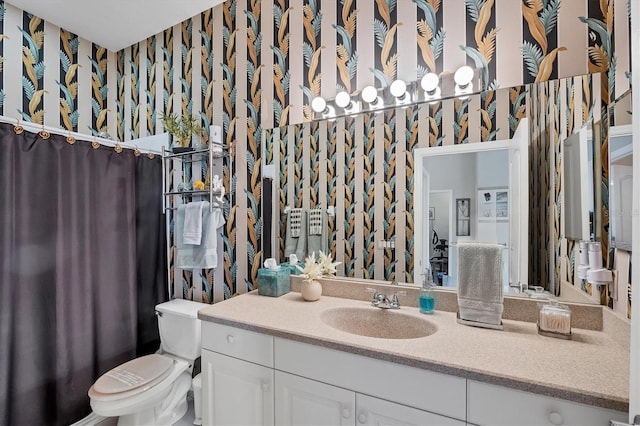 2025 Lynx Run, North Port, FL 34288 - bathroom with wallpapered walls and vanity