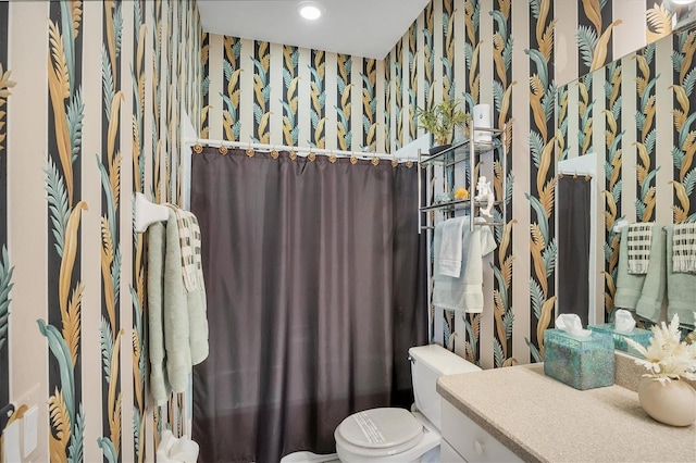 2025 Lynx Run, North Port, FL 34288 - bathroom with wallpapered walls and vanity