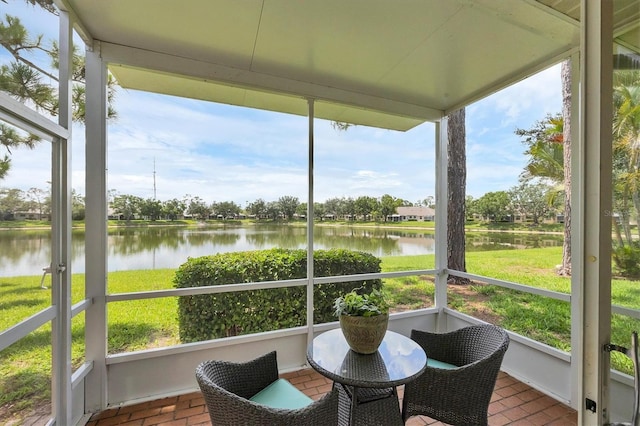 2025 Lynx Run, North Port, FL 34288 - sunroom featuring a water view and plenty of natural light