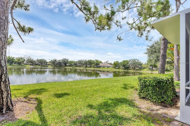 2025 Lynx Run, North Port, FL 34288 - view of green lawn featuring a water view