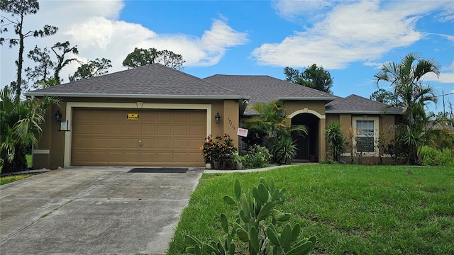 17215 Berwin Ave, Port Charlotte, FL 33948 - ranch-style house featuring stucco siding, concrete driveway, a garage, and a front yard