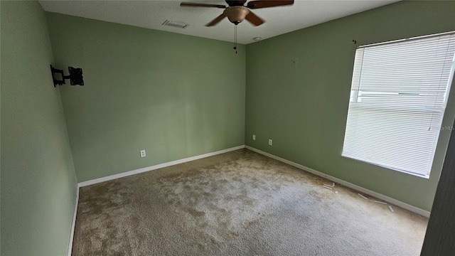 17215 Berwin Ave, Port Charlotte, FL 33948 - carpeted empty room featuring a ceiling fan and healthy amount of natural light