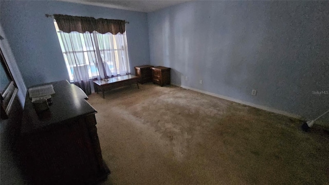 17215 Berwin Ave, Port Charlotte, FL 33948 - unfurnished bedroom featuring carpet flooring and baseboards