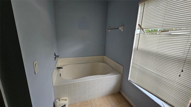 17215 Berwin Ave, Port Charlotte, FL 33948 - bathroom with a garden tub and tile patterned flooring