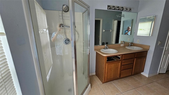 17215 Berwin Ave, Port Charlotte, FL 33948 - full bath featuring tile patterned flooring, a shower stall, and double vanity