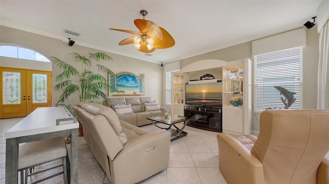 7915 Kavanagh Ct, Sarasota, FL 34240 - living area featuring ceiling fan, french doors, ornamental molding, and light tile patterned floors