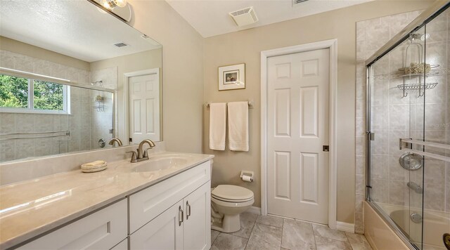 7915 Kavanagh Ct, Sarasota, FL 34240 - bathroom with bath / shower combo with glass door and vanity