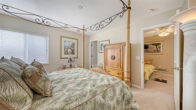 7915 Kavanagh Ct, Sarasota, FL 34240 - bedroom with light carpet and a textured ceiling