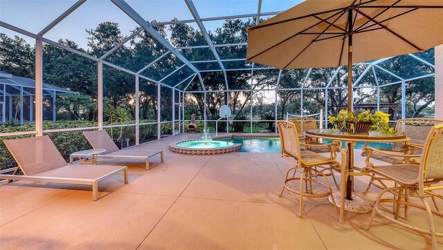 7915 Kavanagh Ct, Sarasota, FL 34240 - view of patio / terrace featuring glass enclosure, an outdoor pool, and an outdoor hot tub