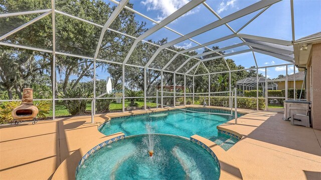 7915 Kavanagh Ct, Sarasota, FL 34240 - view of swimming pool featuring a pool with connected hot tub and a patio