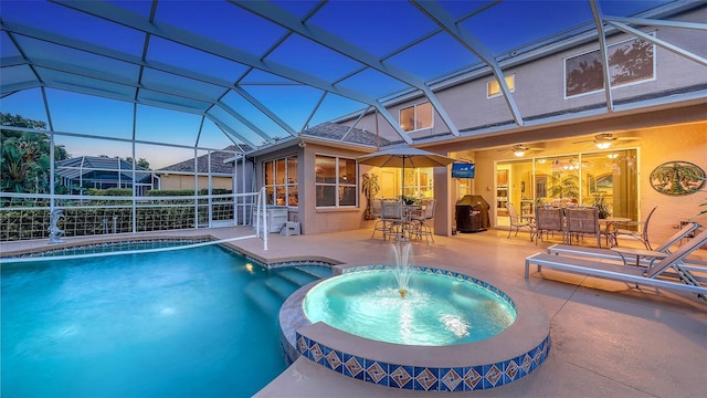 7915 Kavanagh Ct, Sarasota, FL 34240 - view of pool featuring a patio, a pool with connected hot tub, outdoor dining space, a lanai, and ceiling fan