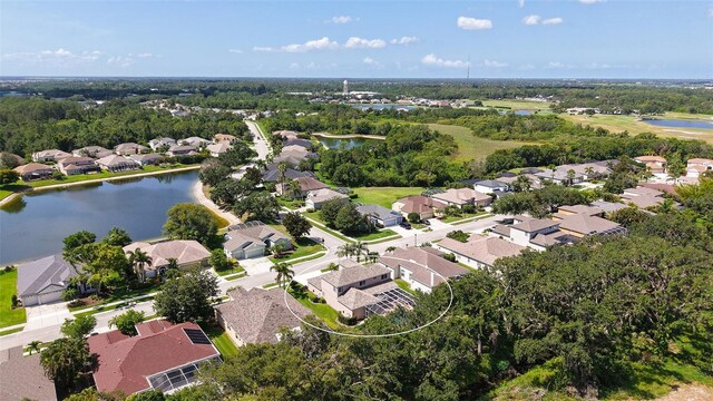 7915 Kavanagh Ct, Sarasota, FL 34240 - aerial overview of property's location with nearby suburban area and a large body of water