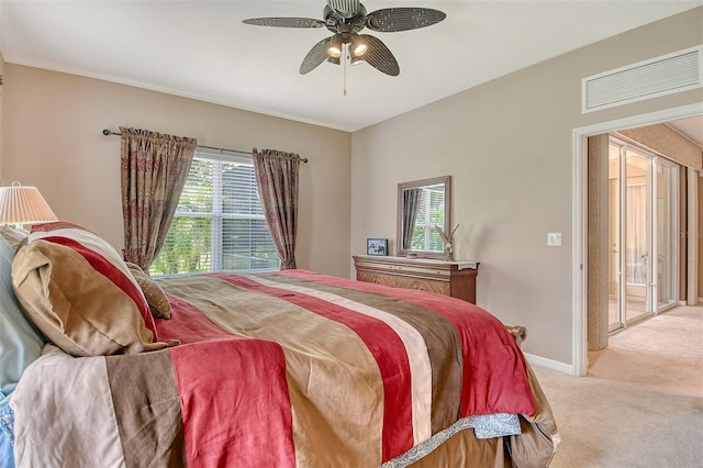 6214 45th Ln E, Bradenton, FL 34203 - bedroom with light colored carpet and ceiling fan