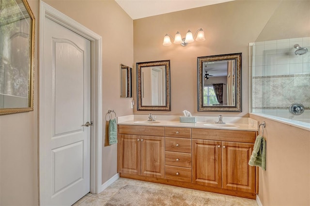 6214 45th Ln E, Bradenton, FL 34203 - bathroom featuring double vanity, tile patterned floors, and tiled shower