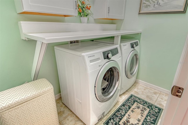 6214 45th Ln E, Bradenton, FL 34203 - laundry area with washer and clothes dryer and cabinet space
