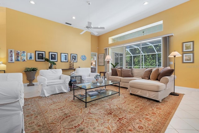 4374 Mirabella Cir, Bradenton, FL 34210 - living room featuring a towering ceiling, ceiling fan, tile patterned floors, recessed lighting, and a sunroom