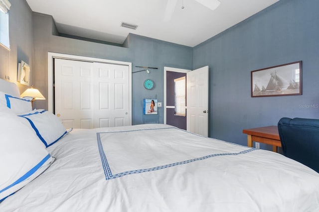 4374 Mirabella Cir, Bradenton, FL 34210 - bedroom featuring a closet and a ceiling fan