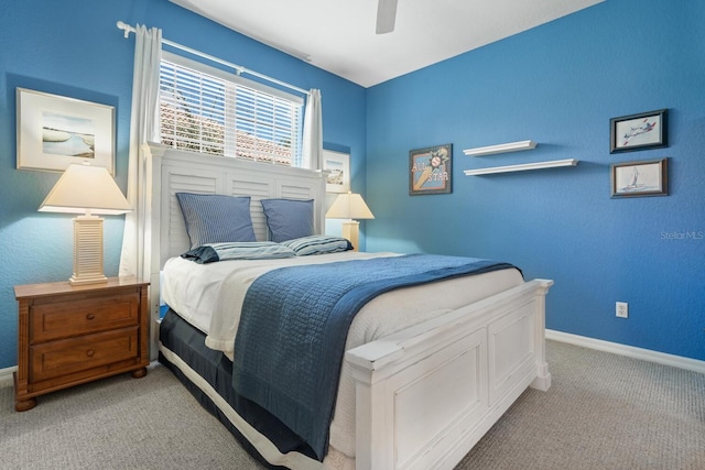4374 Mirabella Cir, Bradenton, FL 34210 - carpeted bedroom featuring baseboards and a ceiling fan