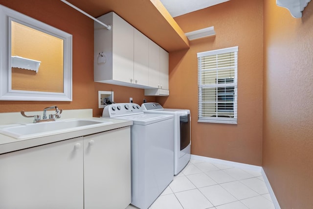 4374 Mirabella Cir, Bradenton, FL 34210 - laundry room featuring cabinet space, independent washer and dryer, and light tile patterned floors