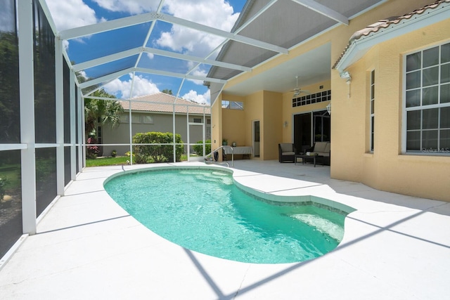 4374 Mirabella Cir, Bradenton, FL 34210 - swimming pool featuring a patio area, a ceiling fan, and an outdoor living space