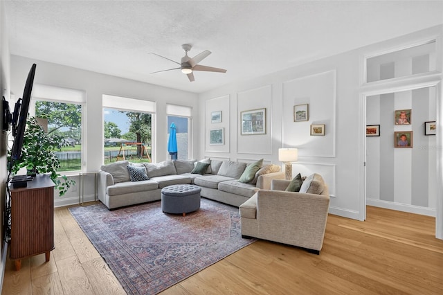 13640 2nd Ave E, Bradenton, FL 34212 - living area with a ceiling fan and wood finished floors