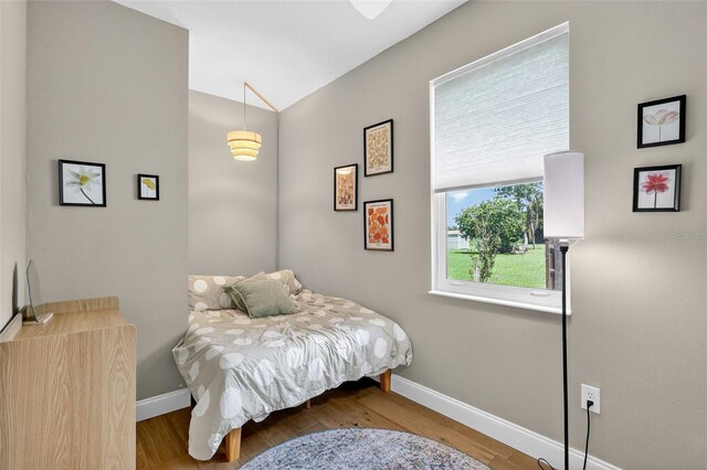 13640 2nd Ave E, Bradenton, FL 34212 - bedroom featuring wood finished floors and vaulted ceiling