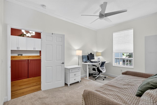 13640 2nd Ave E, Bradenton, FL 34212 - bedroom with crown molding, light colored carpet, an office area, and a ceiling fan