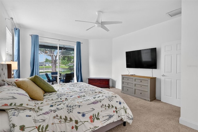 13640 2nd Ave E, Bradenton, FL 34212 - carpeted bedroom with access to outside and ceiling fan