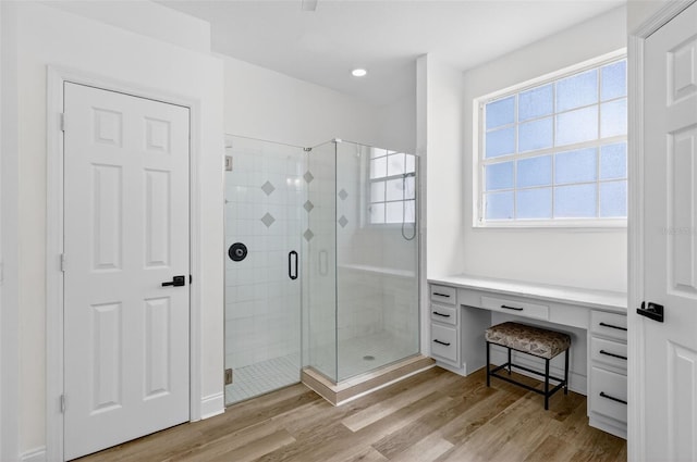 13640 2nd Ave E, Bradenton, FL 34212 - bathroom with wood finished floors, a shower stall, and recessed lighting