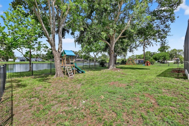 13640 2nd Ave E, Bradenton, FL 34212 - fenced backyard with a playground and a water view