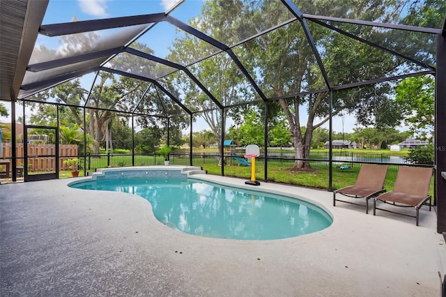 13640 2nd Ave E, Bradenton, FL 34212 - view of swimming pool with a patio, a fenced backyard, a water view, and a lanai