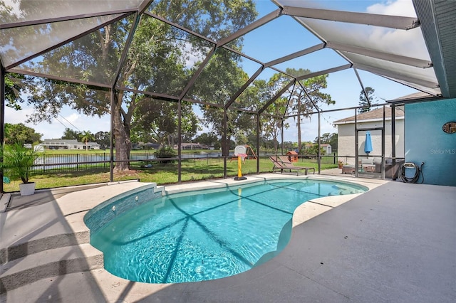 13640 2nd Ave E, Bradenton, FL 34212 - view of swimming pool with a patio and glass enclosure