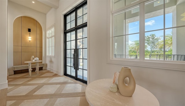 15315 Anchorage Pl, Lakewood Ranch, FL 34202 - doorway with french doors, plenty of natural light, inlaid floor details, and recessed lighting