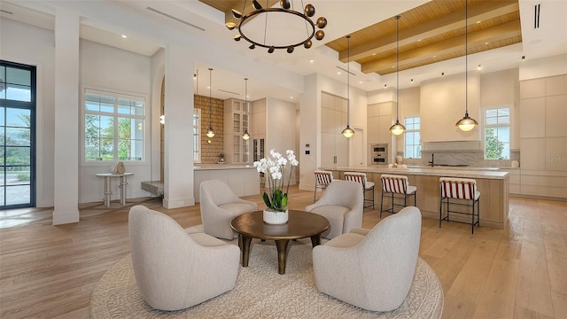 15315 Anchorage Pl, Lakewood Ranch, FL 34202 - living area featuring a wood ceiling with exposed beams, light wood-type flooring, and recessed lighting